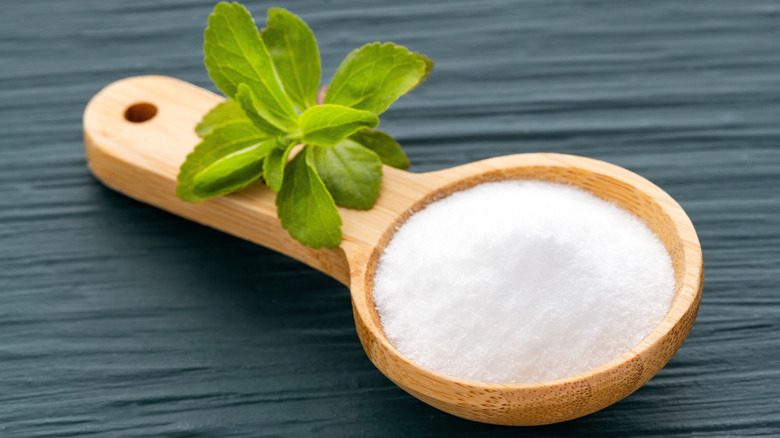 Stevia powder in a wood spoon
