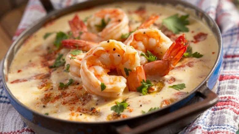 Close up of shallow bowl with southern shrimp and grits