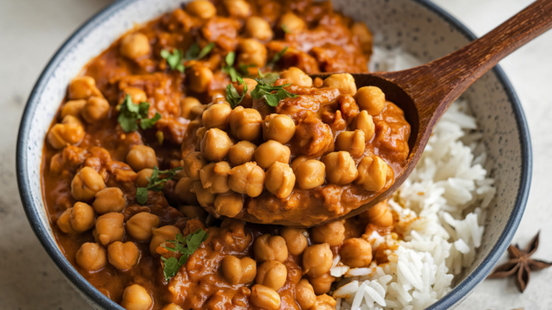 A bowl of chickpea curry with white rice