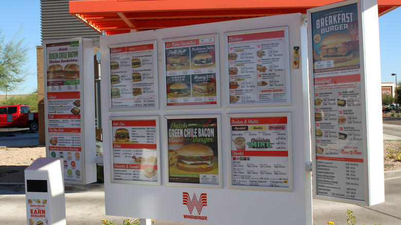 The menu board at a Whataburger drive through.