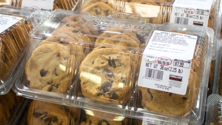 stacked clamshells holding Costco brand chocolate chip cookies