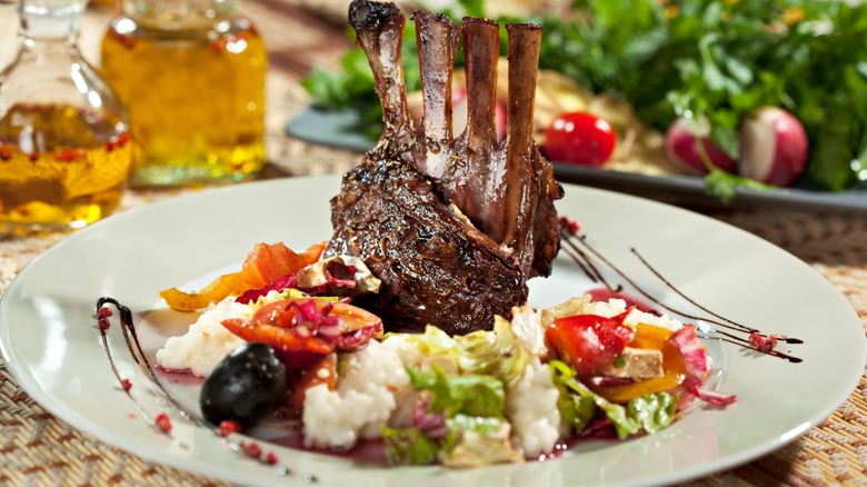 rack of lamb with risotto and veggies