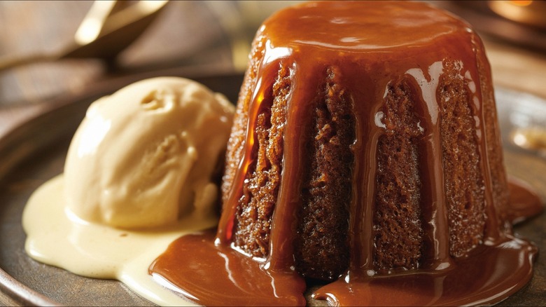 Sticky Toffee Pudding with a scoop of vanilla ice cream on the side