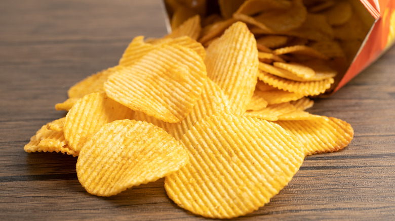 Potato chips spilling out of package