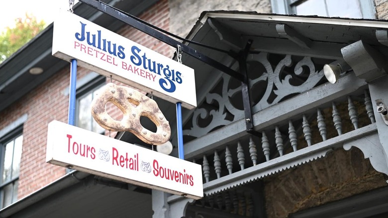 Exterior signage with pretzel shape ay Julius Sturgis Pretzel Bakery in Lititz, Pennsylvania