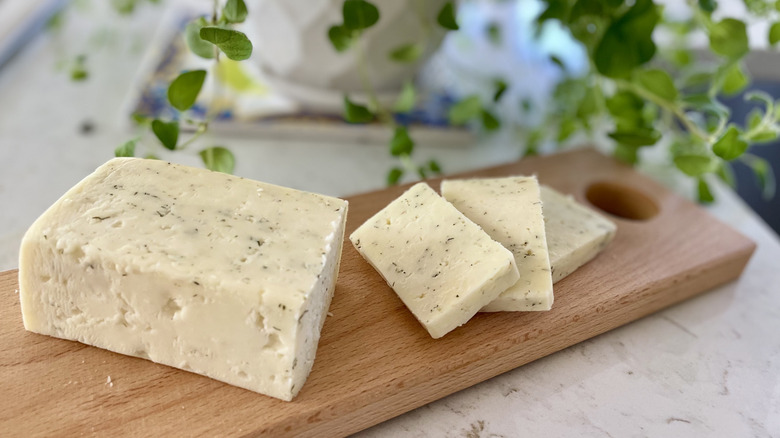 A closeup of Aldi dill havarti cheese block