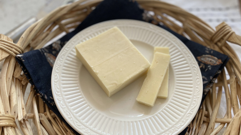 Aldi cheddar and parmesan slices on a white plate