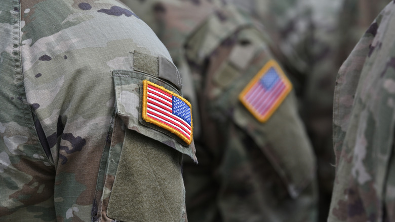 An American flag patch on the sleeve of a military uniform.
