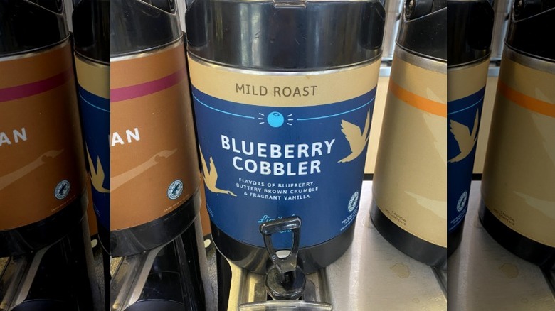Wawa blueberry cobbler coffee dispenser with blue label and text that reads mild roast