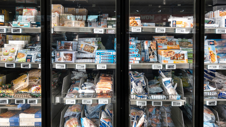 Packages of seafood on display in an Aldi cooler