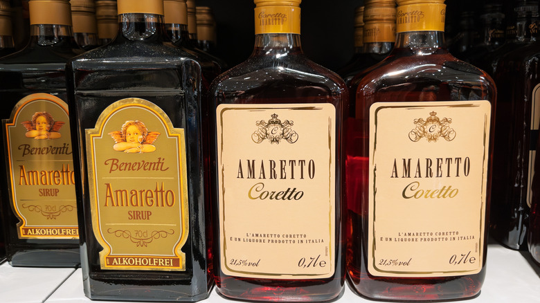 Variety of Amaretto Liqueurs on Store Shelf