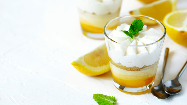 Limoncello - italian Dessert. Lemon Cheesecake Mousse with Whipped Cream in cups. Summer dessert.