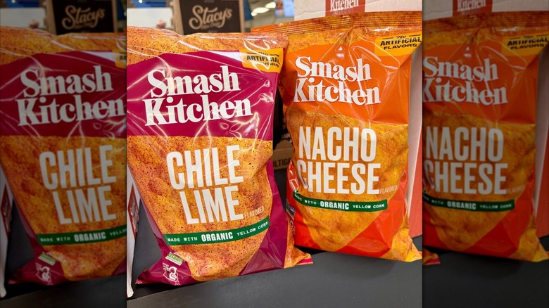 Bags of Smash Kitchen chili lime and nacho cheese tortilla chips