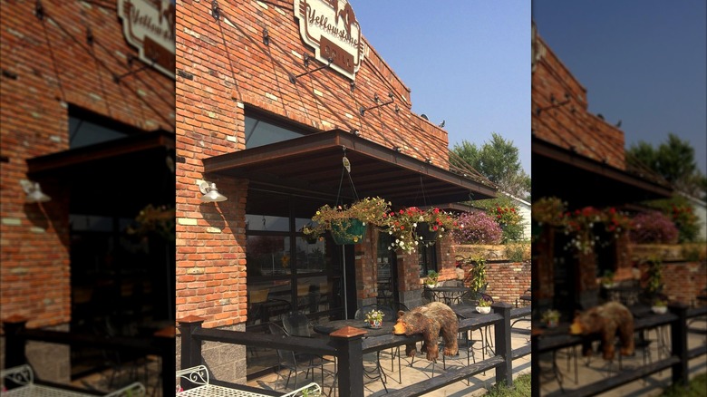 Yellowstone Grill exterior with front porch and flowering hanging baskets