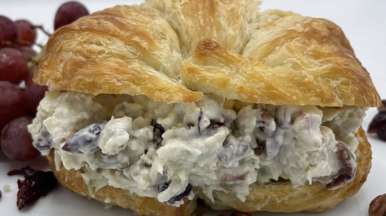 cranberry pecan chicken salad on a croissant