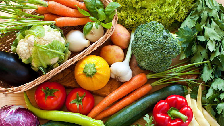 Colorful seasonal produce on a wood  table