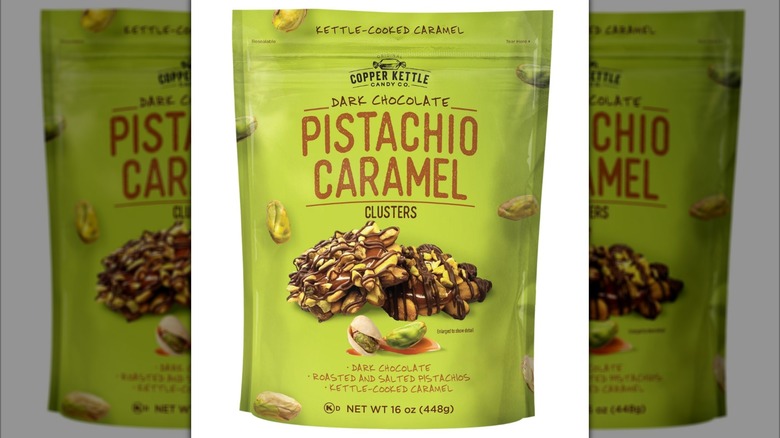 Bag of Copper Kettle Pistachio Caramel Clusters on white background