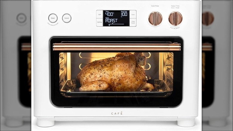 Café Couture Oven on a white background, mirrored