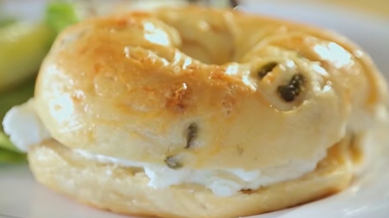 Jalapeño cheddar bagel on a plate