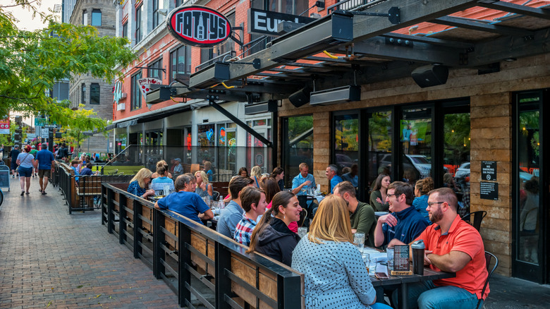A packed outdoor patio at a restaurant in Boise, Idaho