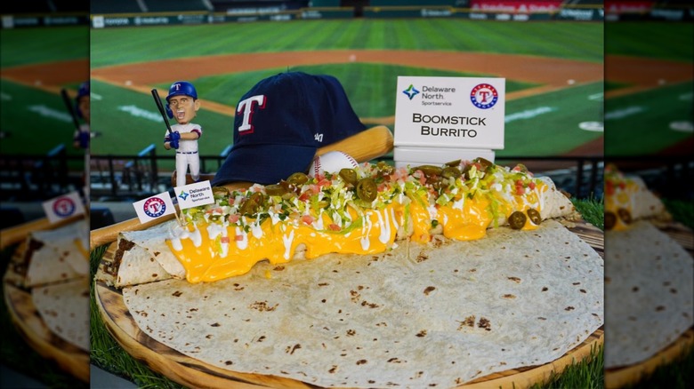 Boomstick Burrito on top of a flour tortilla with Rangers hat and bobblehead