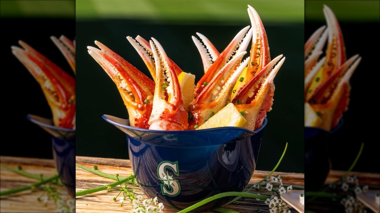 crab claws in a collectible baseball helmet