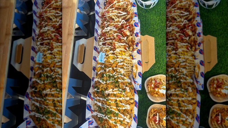 overhead shot of the Battle Boat in a case sitting on fake grass