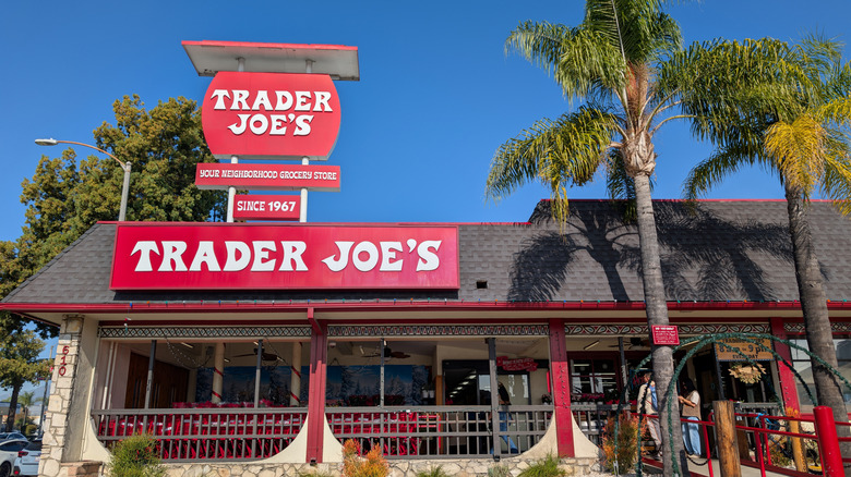 Exterior of a Trader Joe's with palm trees out front