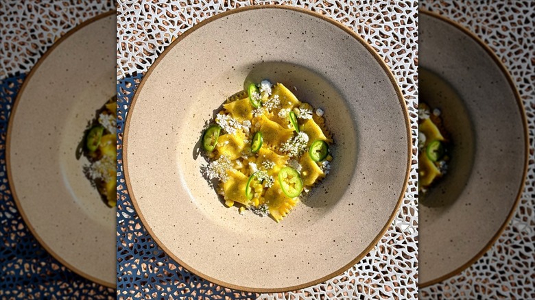 Ricotta-filled pasta in beige bowl