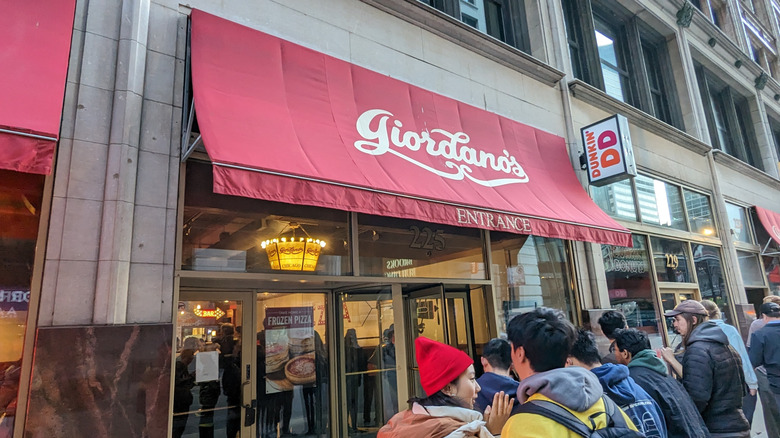 Giordano's exterior with people waiting