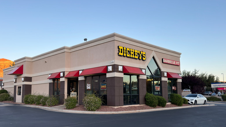 Dickey's Barbecue Pit restaurant exterior on bright day in front of nearly empty parking lot