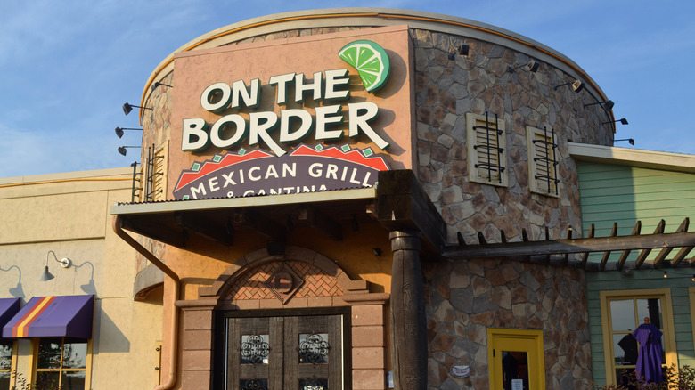 On the Border Mexican Grill & Cantina restaurant exterior on bright day.
