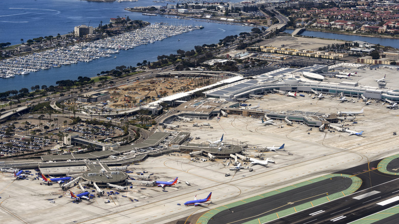 Aerial view of tarmac, airplanes, and airport at San Diego International Airport