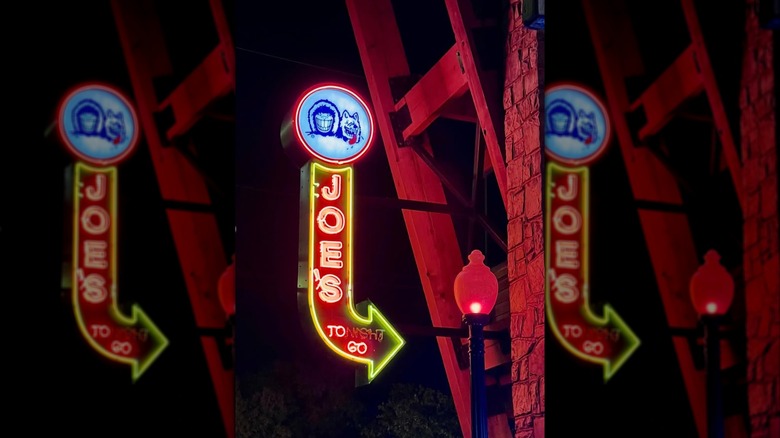 Eskimo Joe's exterior with neon sign lit at night