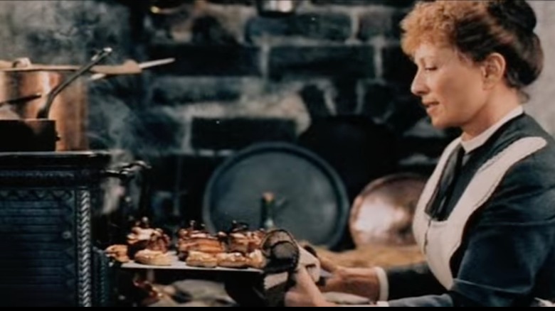 Stéphane Audran preparing food as Babette in "Babette's Feast"