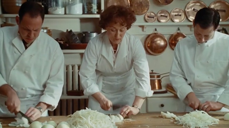Meryl Streep as Julia Child cutting onions in "Julie & Julia"