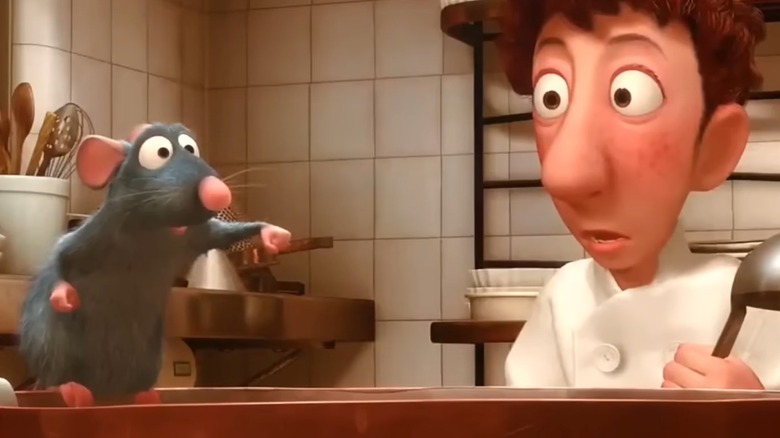 Remy cooking while Linguini watches in "Ratatouille"