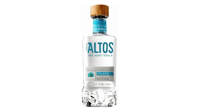 Bottle of Olmeca Altos Plata tequila on a white background.