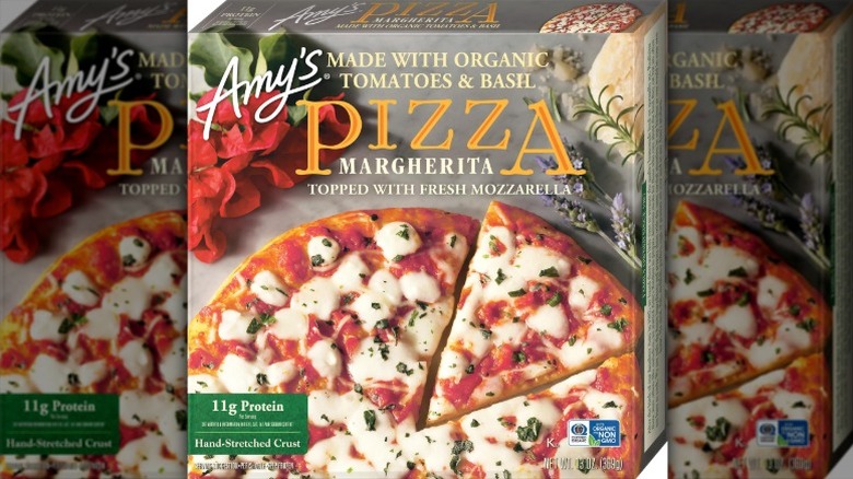 Amy's Margherita Pizza in cardboard packaging on a white background.