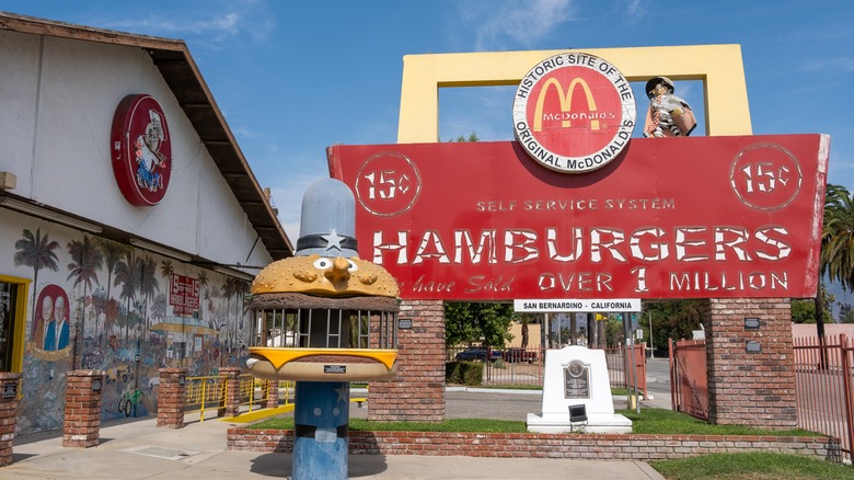A vintage-style sign outside the site of the world's first McDonald's