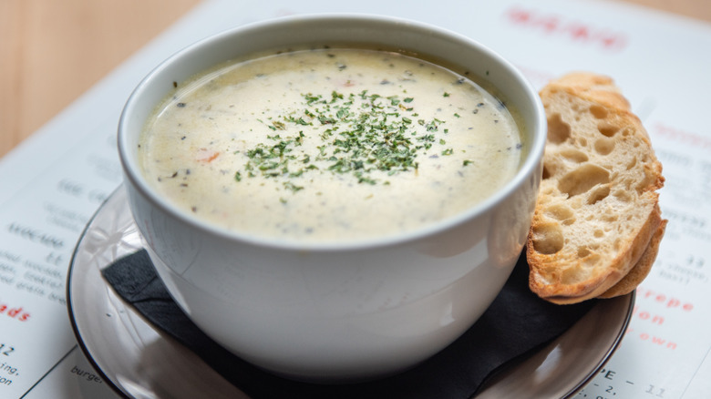 bowl of creamy soup with bread