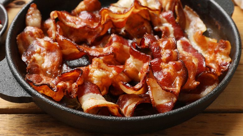 Cooked bacon in a cast iron pan