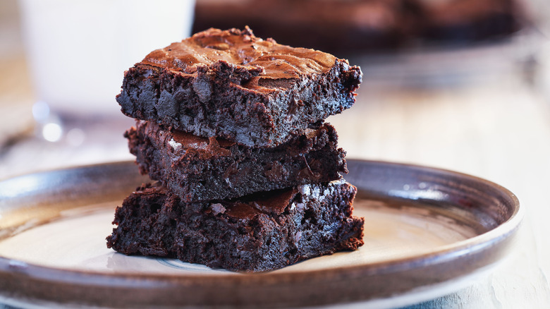 fudgy chocolate brownies stacked on top of eachother