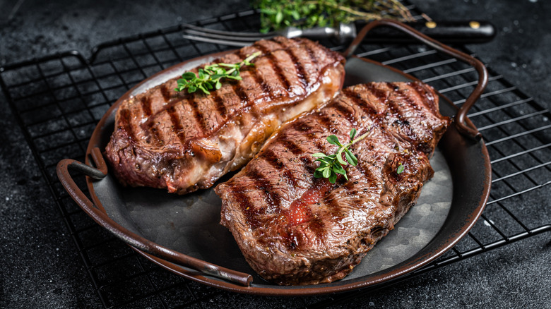 Grilled flat iron steaks garnished