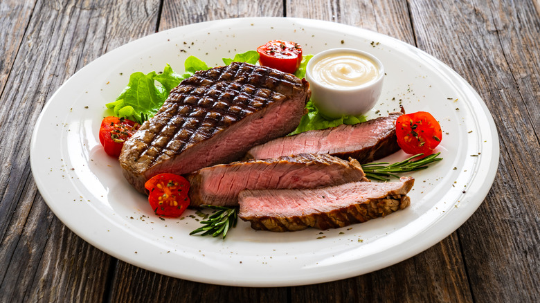 Grilled beef sirloin steak with fresh vegetables