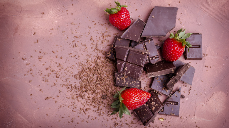 Strawberries and pieces of chocolate bars