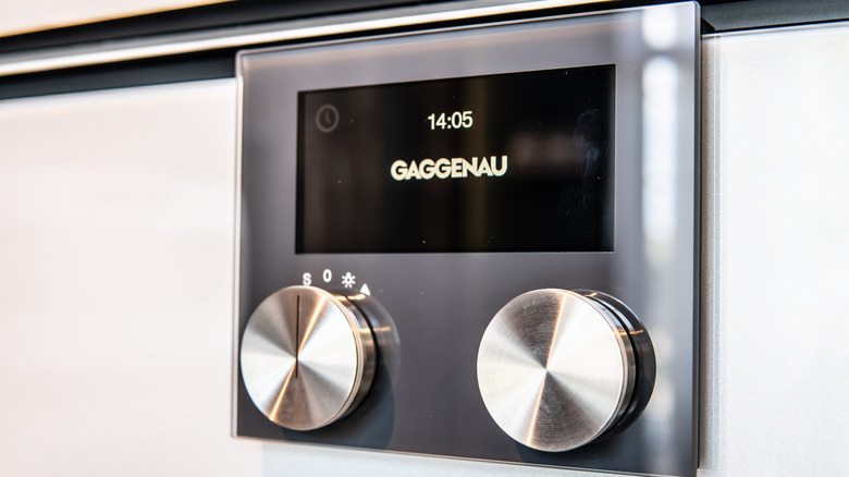 Close up of a touch screen with dials on Gaggenau appliance