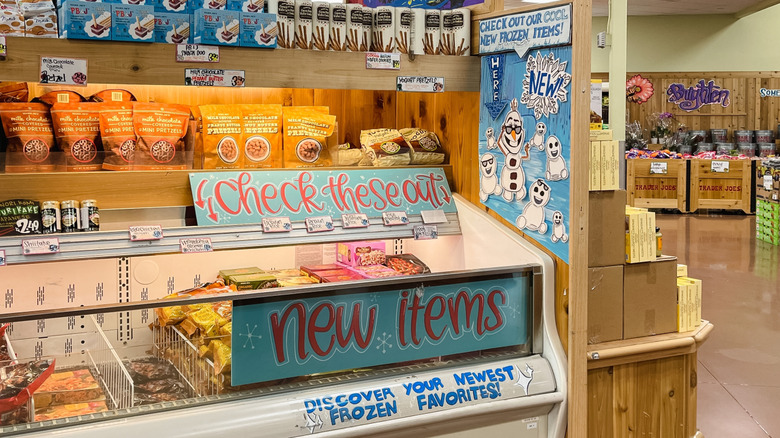 Signs point out new frozen items at Trader Joe's
