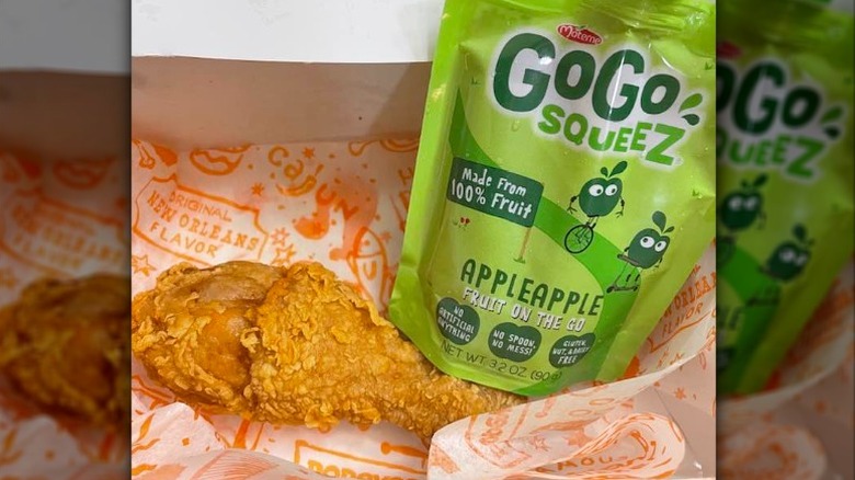Popeyes kids meal with chicken and GoGo Squeeze applesauce pouch