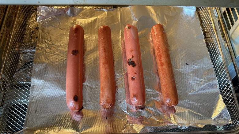 a tray of toasted hot dogs